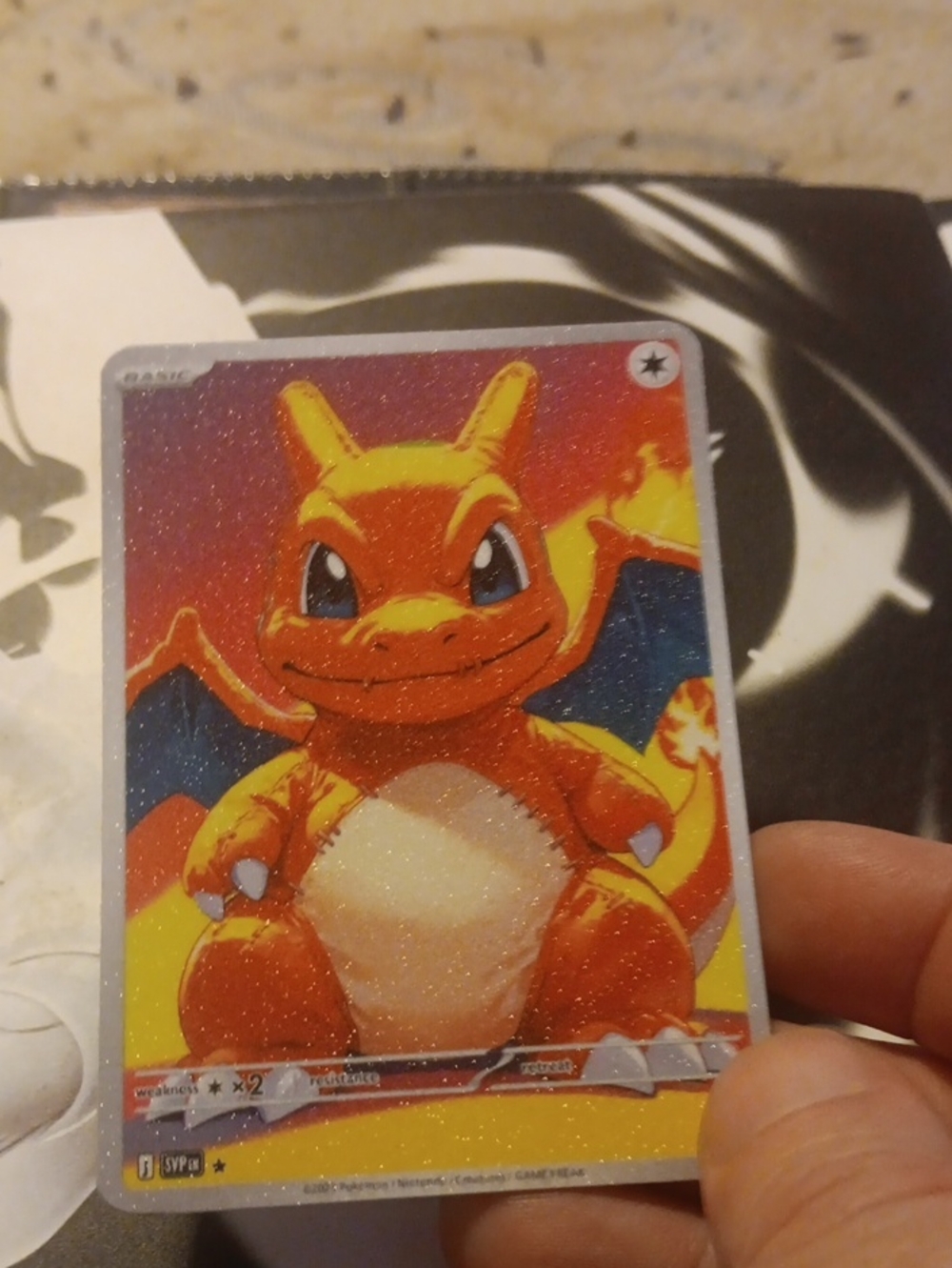 Pokemon Charizard Holographic Trading Card - Orange, Yellow, Blue